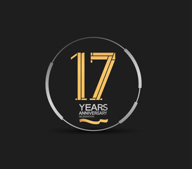 17 years golden anniversary logotype golden number and silver ring. vector can be use for template, company special event and celebration moment