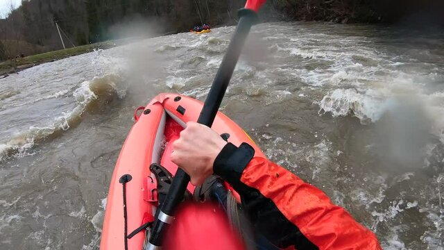 Extreme rafting in small boats on mountain river