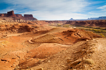 The rugged canyons of Canyonlands National Park extend in all directions as seen from The White Rim Trail above the Green River near Moab, Utah.