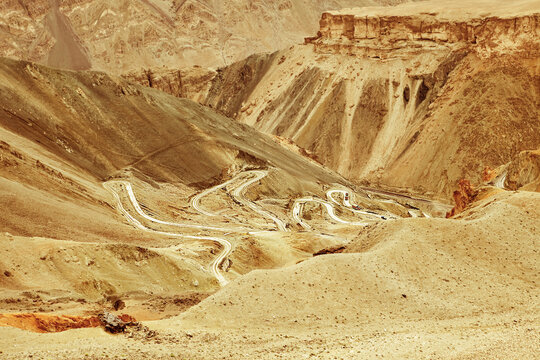 Switchbacks through the mountains of the high desert of Ladakh, India.