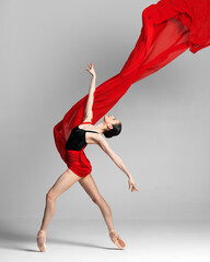 Young beautiful skinny ballerina is posing in studio - 432037043