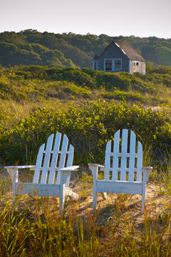 Adirondack chairs on lawn at Martha's Vineyard near the beach