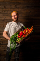 Farmer selling organic veg at market. Rustic style.Healthy food concept