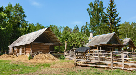 Livestock shed. Wooden barn for cows and goats. Farming