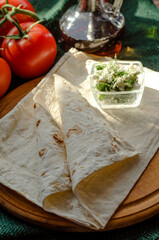Armenian thin lavash and cottage cheese with herbs