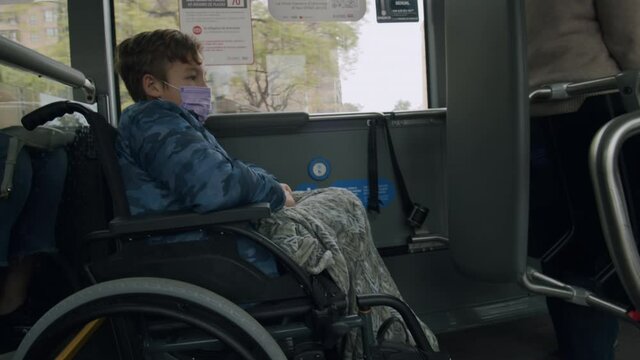 Disabled bus passenger in wheelchair