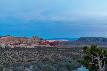Calico Hills with Distant Las Vegas City Lights Blue Diamond Hill and Juniper as seen from Red Rock...