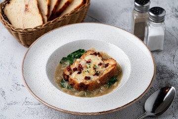 Toasted crunchy croutons with cheese and onion in a fancy restaurant