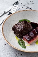 Close up of sous vide beef with mashed potato, slow cooking in a restaurant