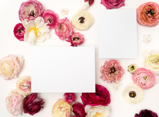 Beautiful fresh flower floral flat lay with blank wedding stationery card