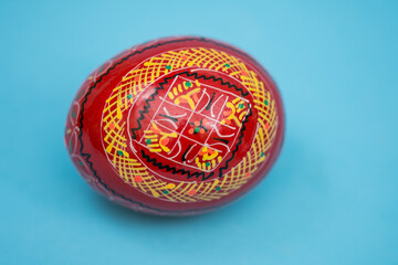 Wooden colored red egg  fromROMANIA,