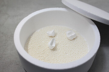 firing the zirconia crown in the oven with high temperature. Dental crown.