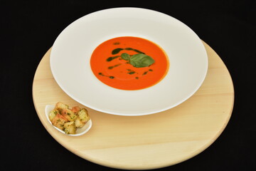  plate with red -orange sauce, salsa sauce,Taco sauce with basil