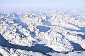 Aerial view of the snowy landscapes of the Arctic Archipelago in winter © Udara Senanayake/Wirestock