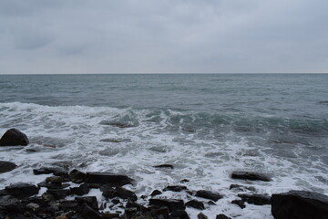 Big waves on the Black Sea. Stone beach. The photo was taken near the resort town of Anapa.