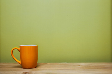 A cup of coffee on wooden table