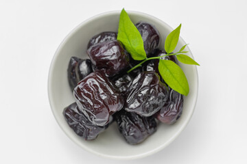 Candied jujube, sweet chinese red date fruit on white background.