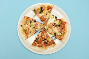 pieces of pizza on the plate