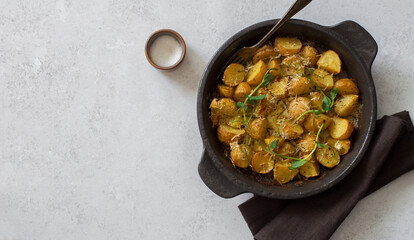 Oven baked new potatoes with parmesan cheese and seasonings