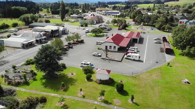 Aerial crane of main street, commercial area, historic train station. Lumsden
