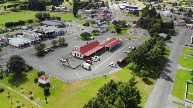Aerial orbit of Lumsden, New Zealand, cityscape of small village infrastructure