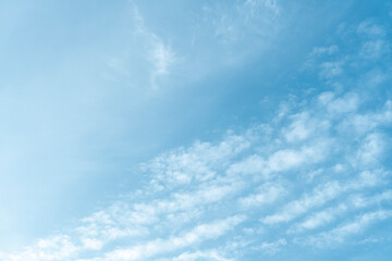 blue sky with white soft clouds