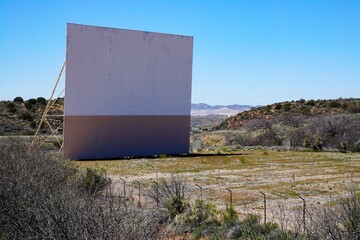 An abandoned drive in movie theatre in the desert out of Globe, Arizona.
