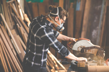 Carpenter woking at wood workshop. Construction industry concept. Tools for woodwrok pencil hammer meter and screw-driver.