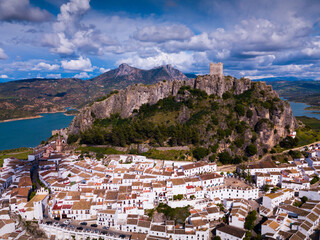 Picturesque scene of whitewashed village Zahara de la Sierra and mountain lake, Spain © JackF