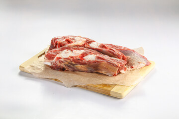 Raw bones for cooking over board