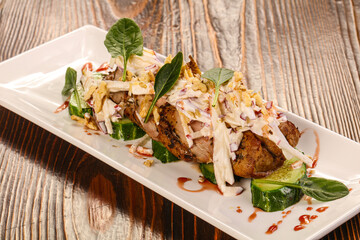 Baked pork with vegetables and sauce