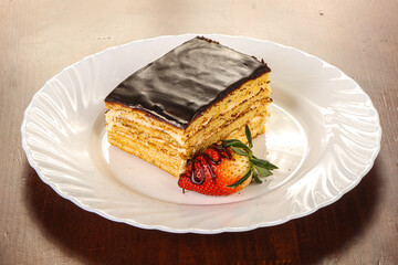 Sweet layered cake served strawberry