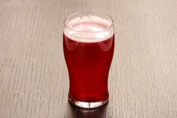 Strawberry homemade lemonade in the glass