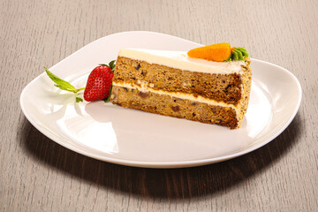 Carrot cake slice with cream