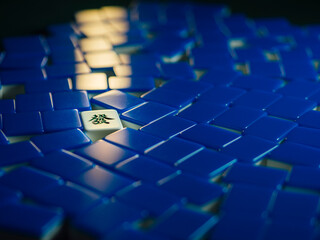 Blue mahjong tiles with fortune lit up fa