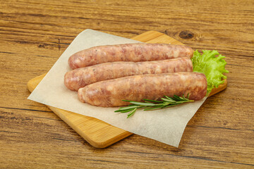 Raw pork meat sausages for grill