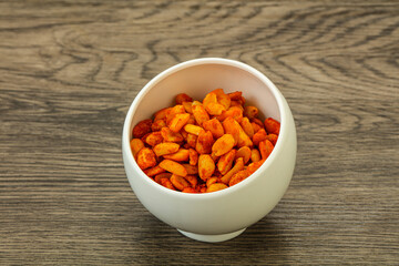 Chili peanut snack in the bowl