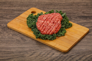 Raw beef burger cutlet for cooking