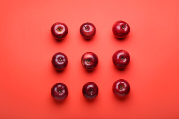 Fresh red apples on color background