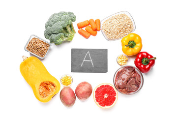 Healthy products rich in vitamin A on white background