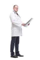 in full growth. qualified doctor looking at an x-ray .