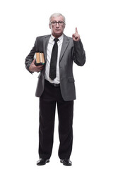 smiling business man with a stack of books.