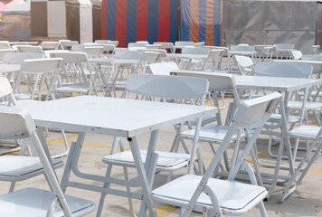 White table and chairs in the dining area