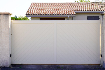 white beige street home steel door aluminum gate slats portal access house