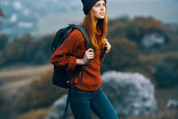 hikers in the mountains travel walk lifestyle fresh air