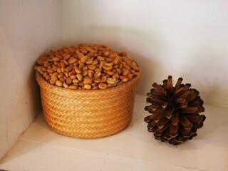 Ground bean seeds stored in a tray.