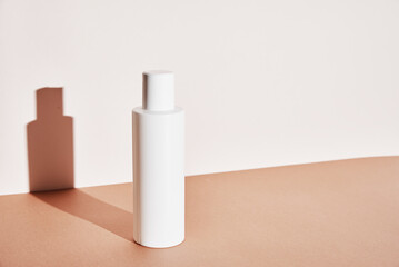 White cosmetics mockup on beige background