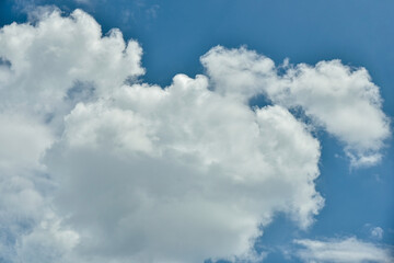 Beautiful white clouds on blue sky background.