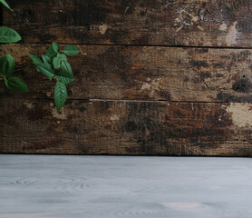 old wood wall with leaves