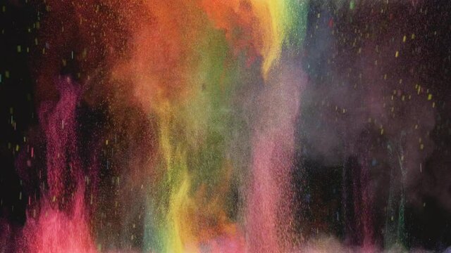 The beautiful colorful explosion of small particles. slow motion